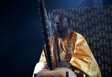 Malian musician Toumani Diabate performs on May 21, 2017 on the sidelines of the 70th edition of the Cannes Film Festival in Cannes, southern France. (Photo by Laurent EMMANUEL / AFP)